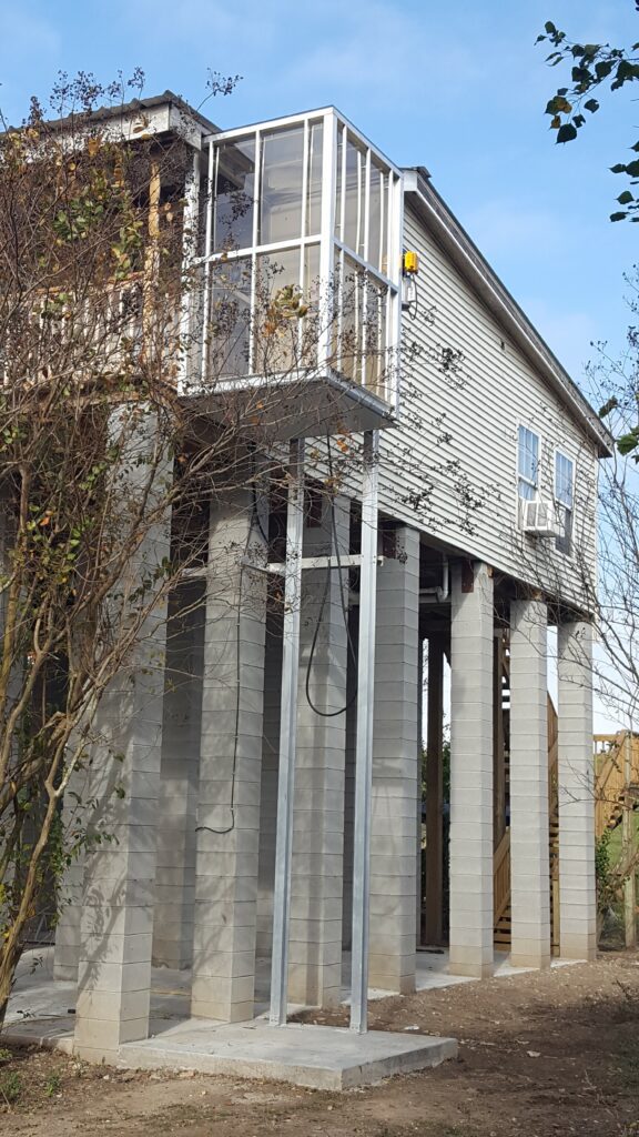 side view of the house with elevator