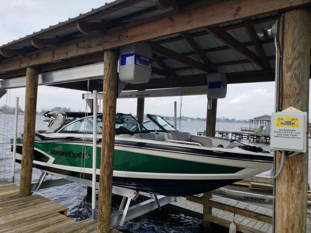 green and white boat side view