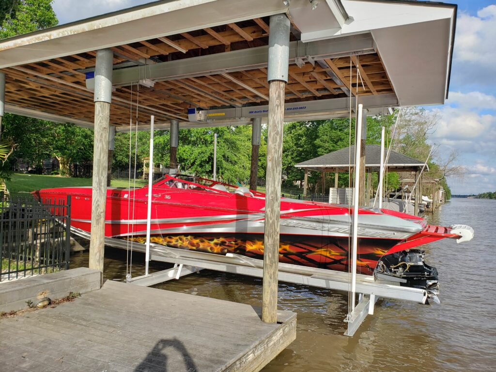 side view of red and white color boat