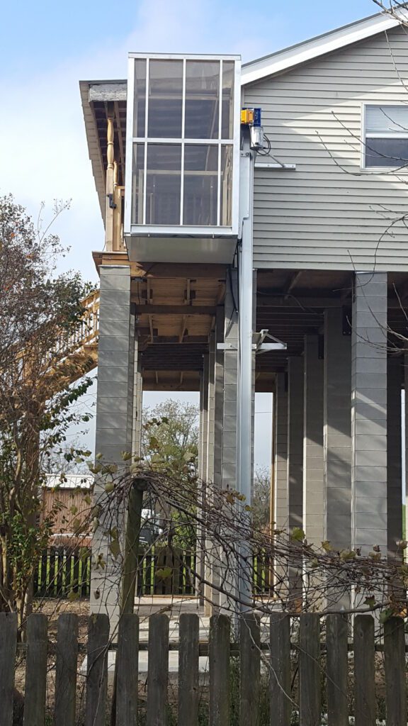 partial view of house with outdoor elevator